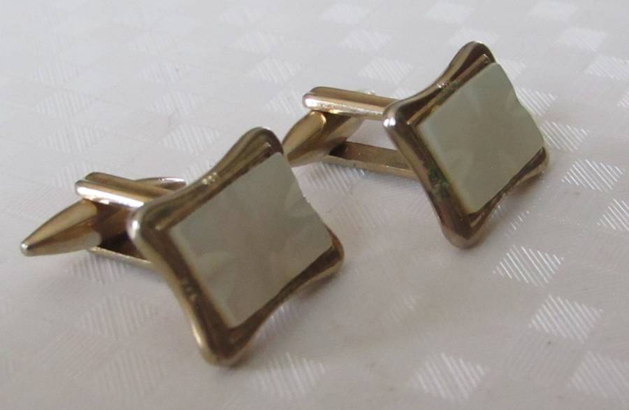 Vintage gilt cufflinks with mother of pearl decoration signed Gilda Stratton