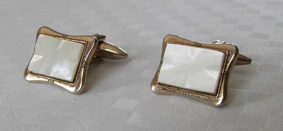 Vintage gilt cufflinks with mother of pearl decoration signed Gilda Stratton