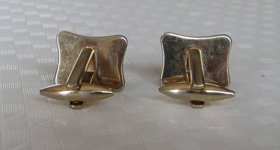 Vintage gilt cufflinks with mother of pearl decoration signed Gilda Stratton