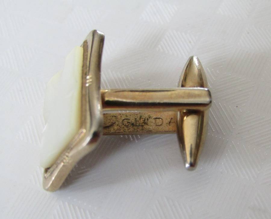 Vintage gilt cufflinks with mother of pearl decoration signed Gilda Stratton