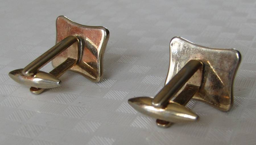 Vintage gilt cufflinks with mother of pearl decoration signed Gilda Stratton
