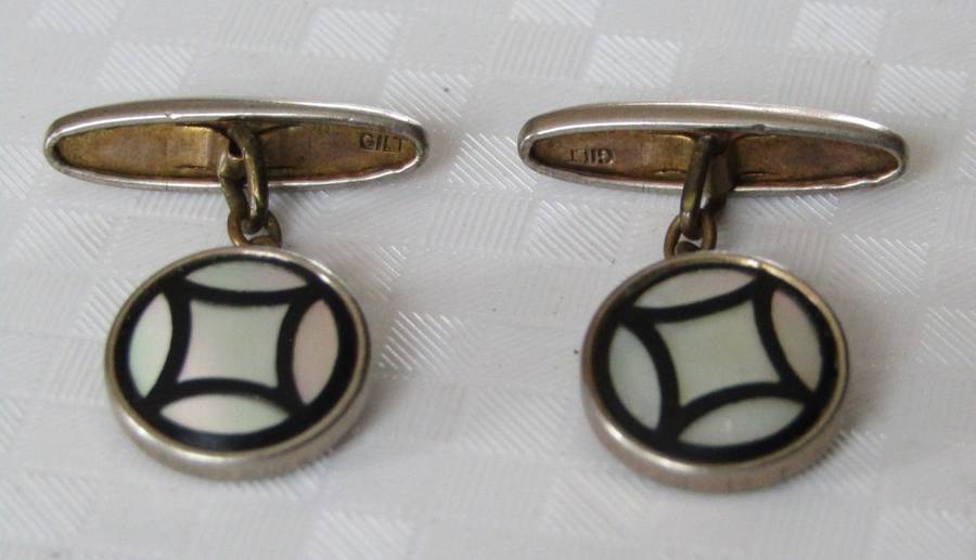Vintage Art Deco mother of pearl and onyx cufflinks marked `Gilt`