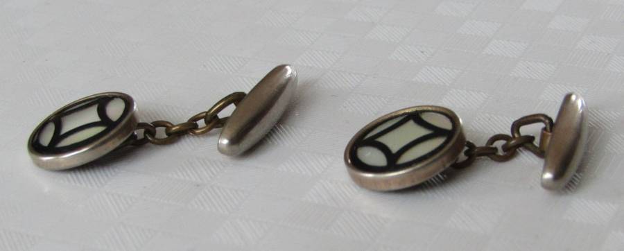 Vintage Art Deco mother of pearl and onyx cufflinks marked `Gilt`