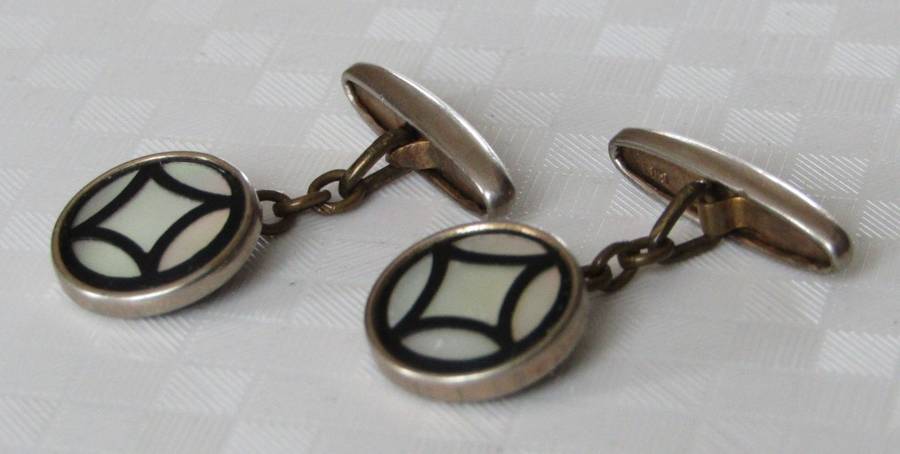 Vintage Art Deco mother of pearl and onyx cufflinks marked `Gilt`