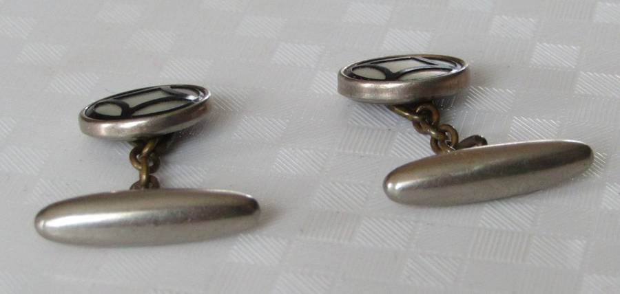 Vintage Art Deco mother of pearl and onyx cufflinks marked `Gilt`