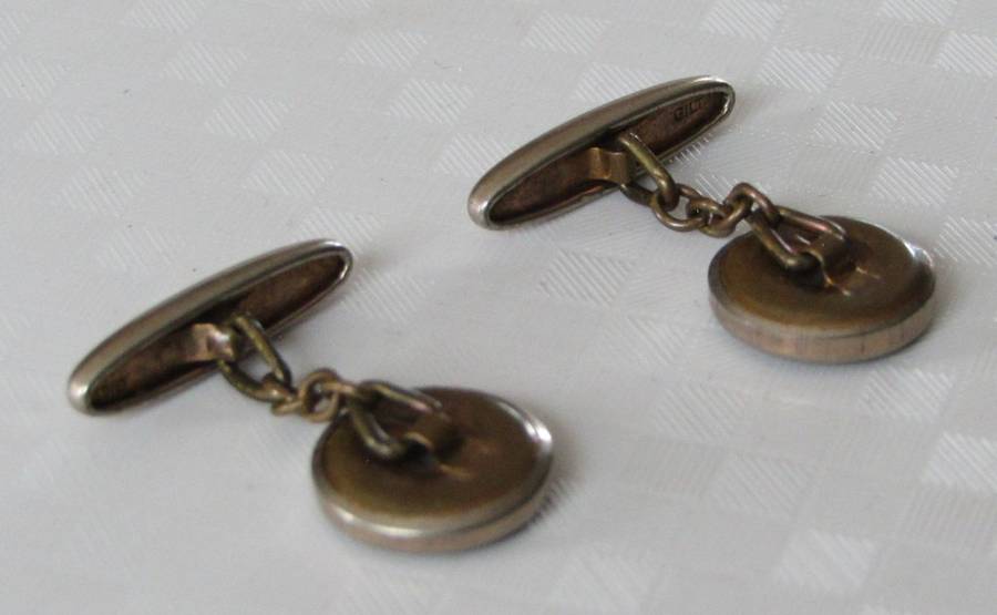 Vintage Art Deco mother of pearl and onyx cufflinks marked `Gilt`