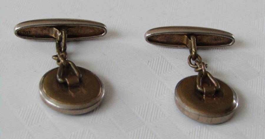 Vintage Art Deco mother of pearl and onyx cufflinks marked `Gilt`