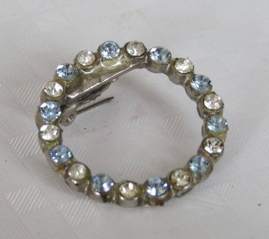 Vintage Silver Tone Circle of Life Brooch/Hat Pin with Clear and Light Blue Rhinestones