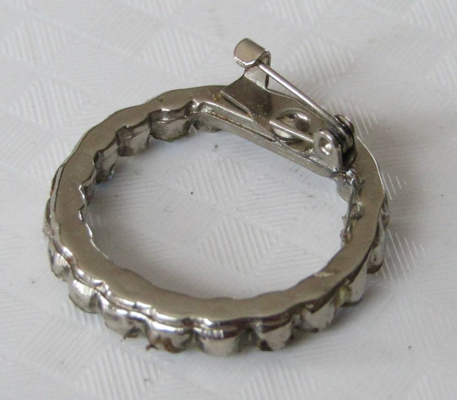 Vintage Silver Tone Circle of Life Brooch/Hat Pin with Clear and Light Blue Rhinestones