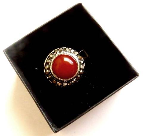 Antique silver tone fashion ring with smooth round red stone
