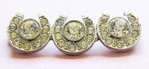 Vintage silver tone and sparkling clear stone horseshoe brooch pin