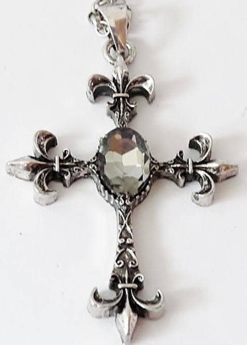Fleur de lis cross pendant on a long silver tone chain