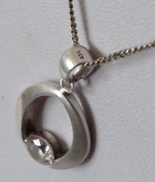 Marked 925 2 mm Silver chain with marked 925 silver pendant and a single clear stone