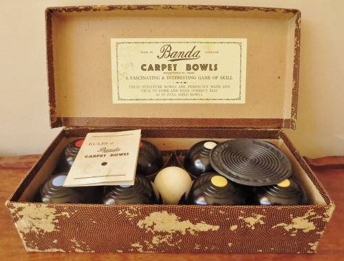 Vintage 1930's set of Banda carpet bowls in original box with rules booklet and rubber toe mat