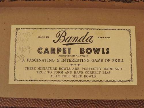 Vintage 1930's set of Banda carpet bowls in original box with rules booklet and rubber toe mat