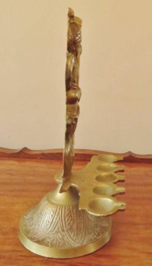 Vintage solid brass Hindu goddess Saraswati with 5 oil lamps on an engraved base