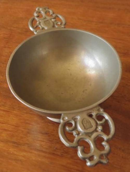 Vintage European pewter double handled porringer bowl on a raised foot