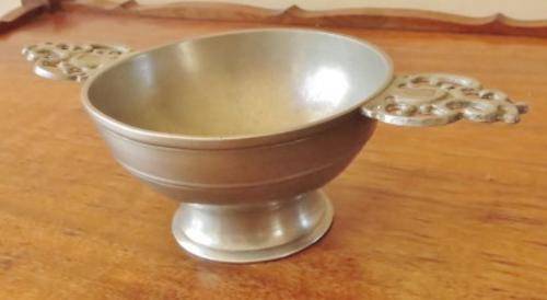 Vintage European pewter double handled porringer bowl on a raised foot