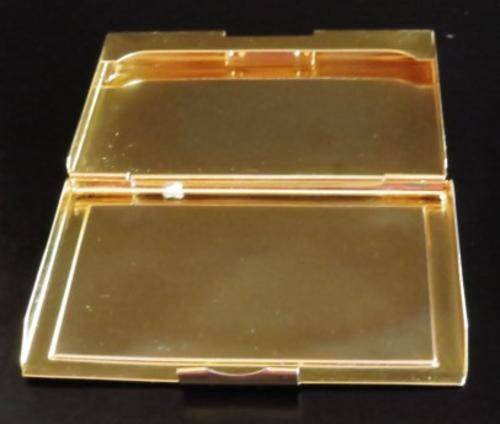 Vintage gold tone and faux leather business card holder