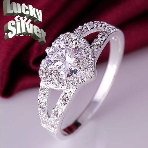 Fantastic price!! Sterling Silver - filled Ring with simulated diamonds at LOW LOW price