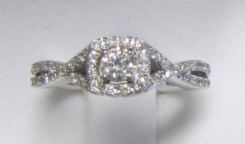 **SCINTILLATING [R34698]** EYE CLEAN [0.625ct] TWIST DIAMOND RING [2.824g] WHITE GOLD