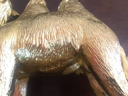 A Pair of Golden `World of Feng Shui` Camels