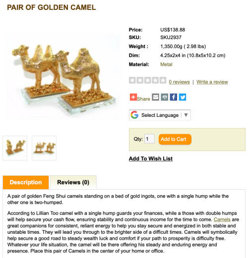 A Pair of Golden `World of Feng Shui` Camels