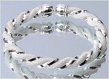 SILVER TONED TWISTED BANGLE - VERY BEAUTIFUL