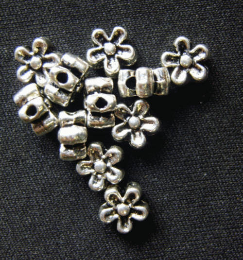 Nickle Flower Spacer, 7mm x 3mm - Pack of 50.