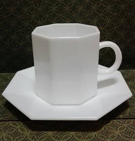 Milk glass cup and saucer