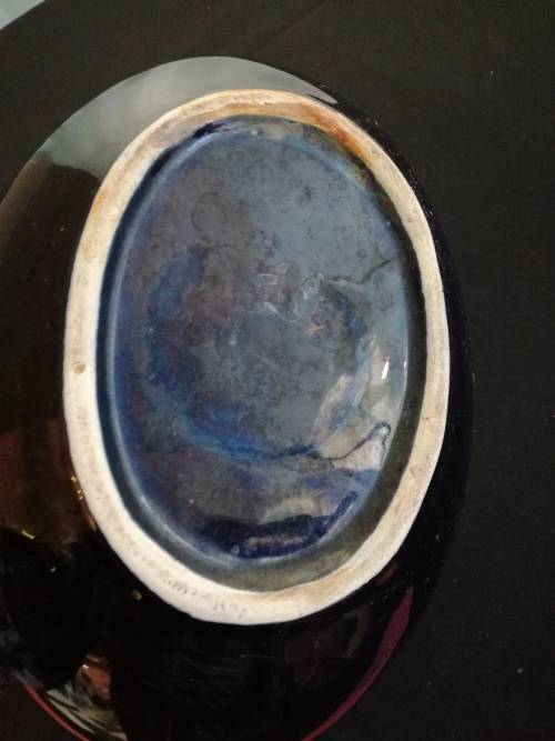 Stunning oval navy blue vase with metal flower frog