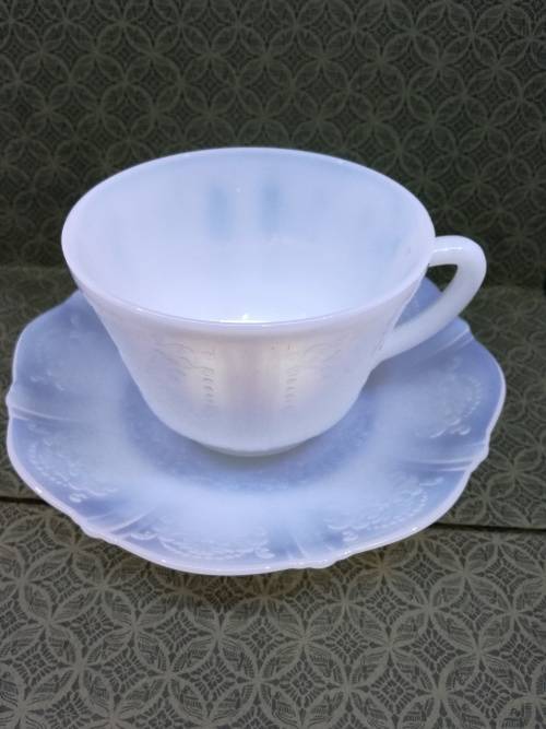Stunning pressed milk glass cup and saucer!