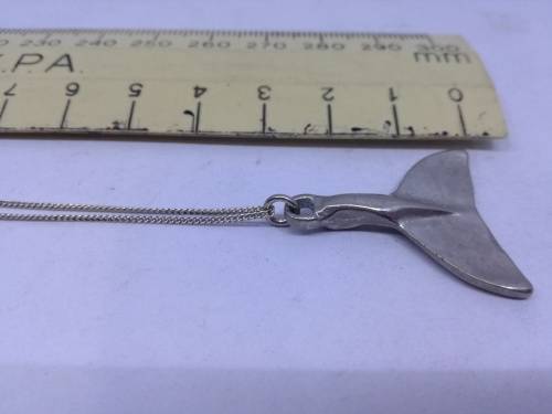 Whale tail neclace - the chain is silver 925, but I cannot find markings on the tail