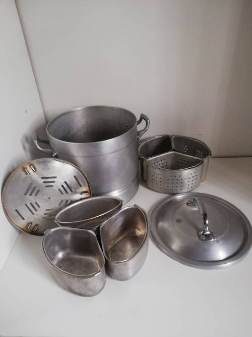Vintage aluminum stock pot with small triangle pots to fit inside! Heavy duty