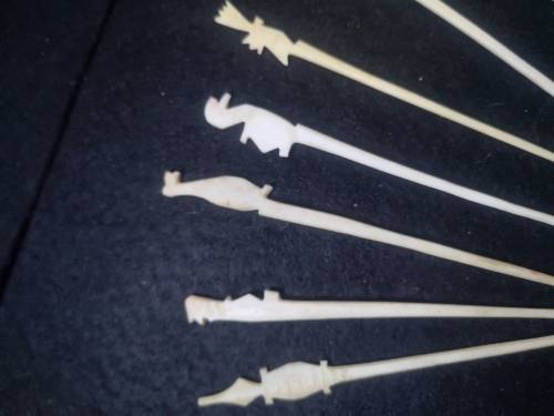 Looks like handmade cocktail/toothpicks