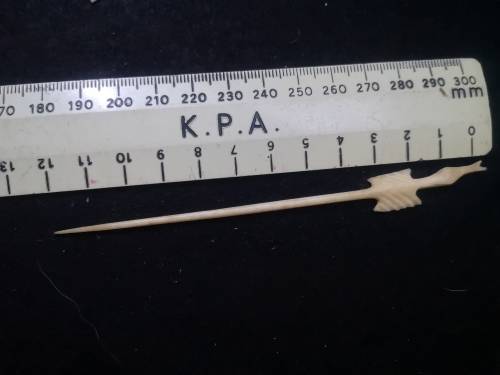 Looks like handmade cocktail/toothpicks