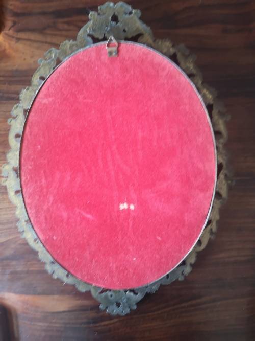 Vintage ornate metal frame with concave glass! Look!