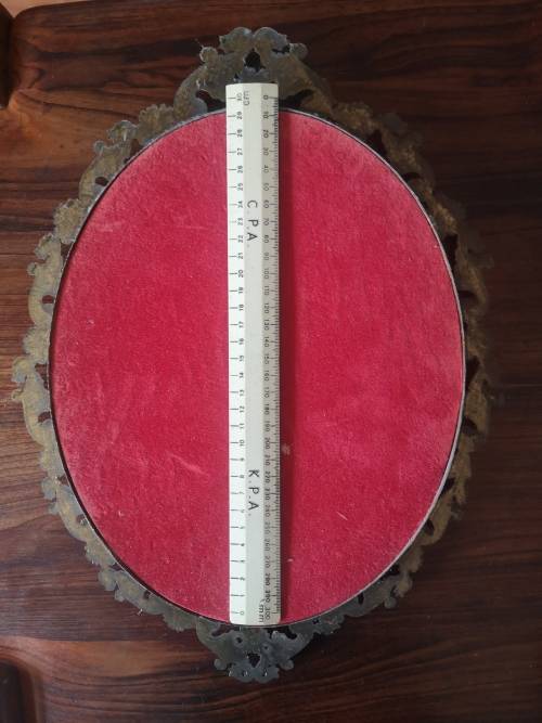 Vintage ornate metal frame with concave glass! Look!