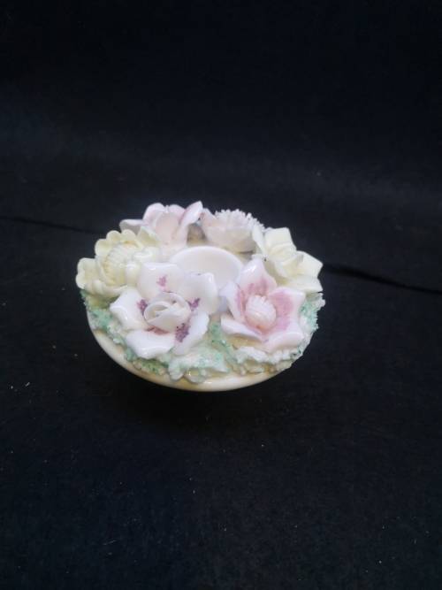 Porcelain finger hole candle holder