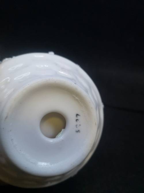 Porcelain finger hole candle holder