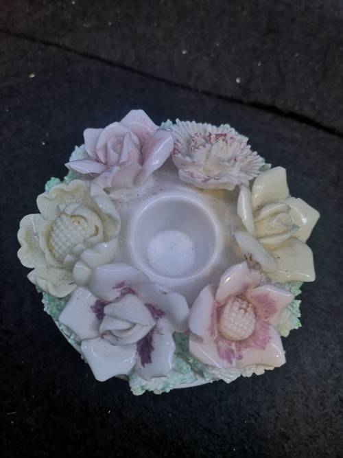 Porcelain finger hole candle holder