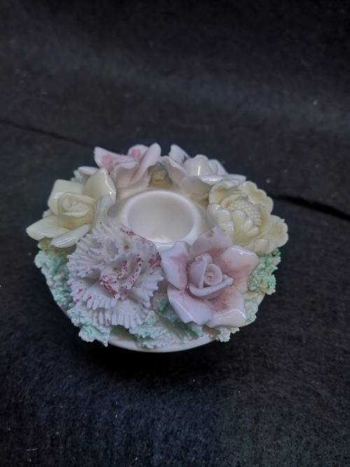 Porcelain finger hole candle holder