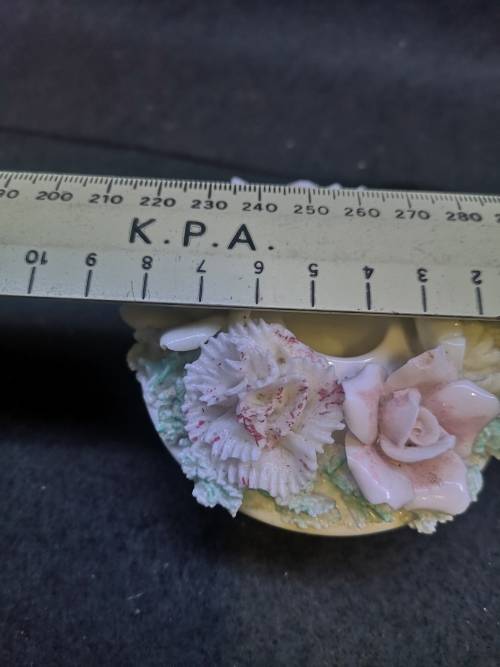 Porcelain finger hole candle holder