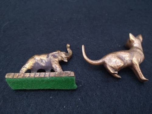 Mini bronze elephant and a cat