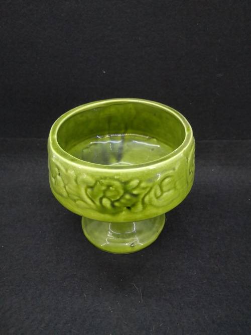 Footed green ceramic vase