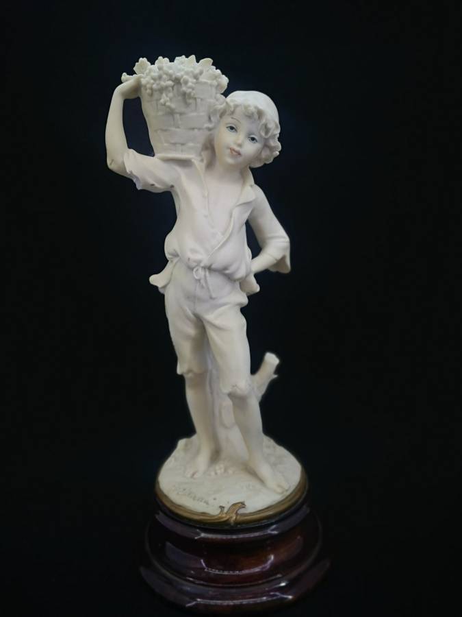 Vintage Florence sculpture D`arte by Guiseppe Armani 1982 - Boy with grapes - note chip on elbow