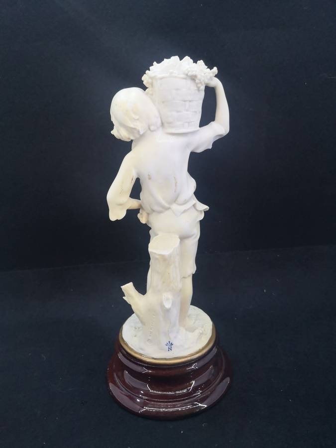 Vintage Florence sculpture D`arte by Guiseppe Armani 1982 - Boy with grapes - note chip on elbow