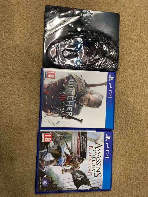 PlayStation 4 Original in original box with both a wired and wires less controller. Games included.