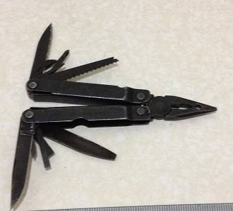 Leatherman Super Tool Black Oxide- Retired Model. + Leatherman Pouch Hor/Ver Belt Loops