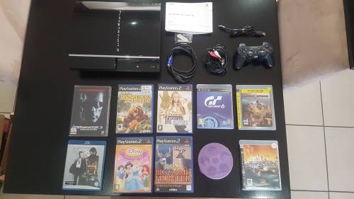 PLAYSTATION3 60GB WITH GAMES AND MOVIES